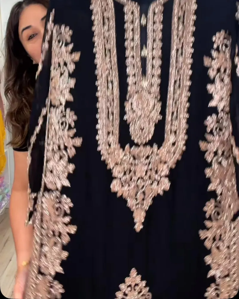 Navy suit with gold embroidery down the front